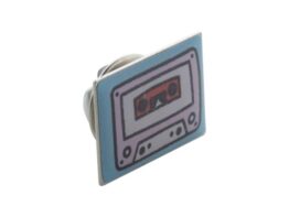 Oran, metal badge